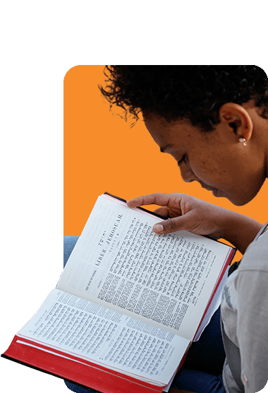 Woman reading a bilingual Bible