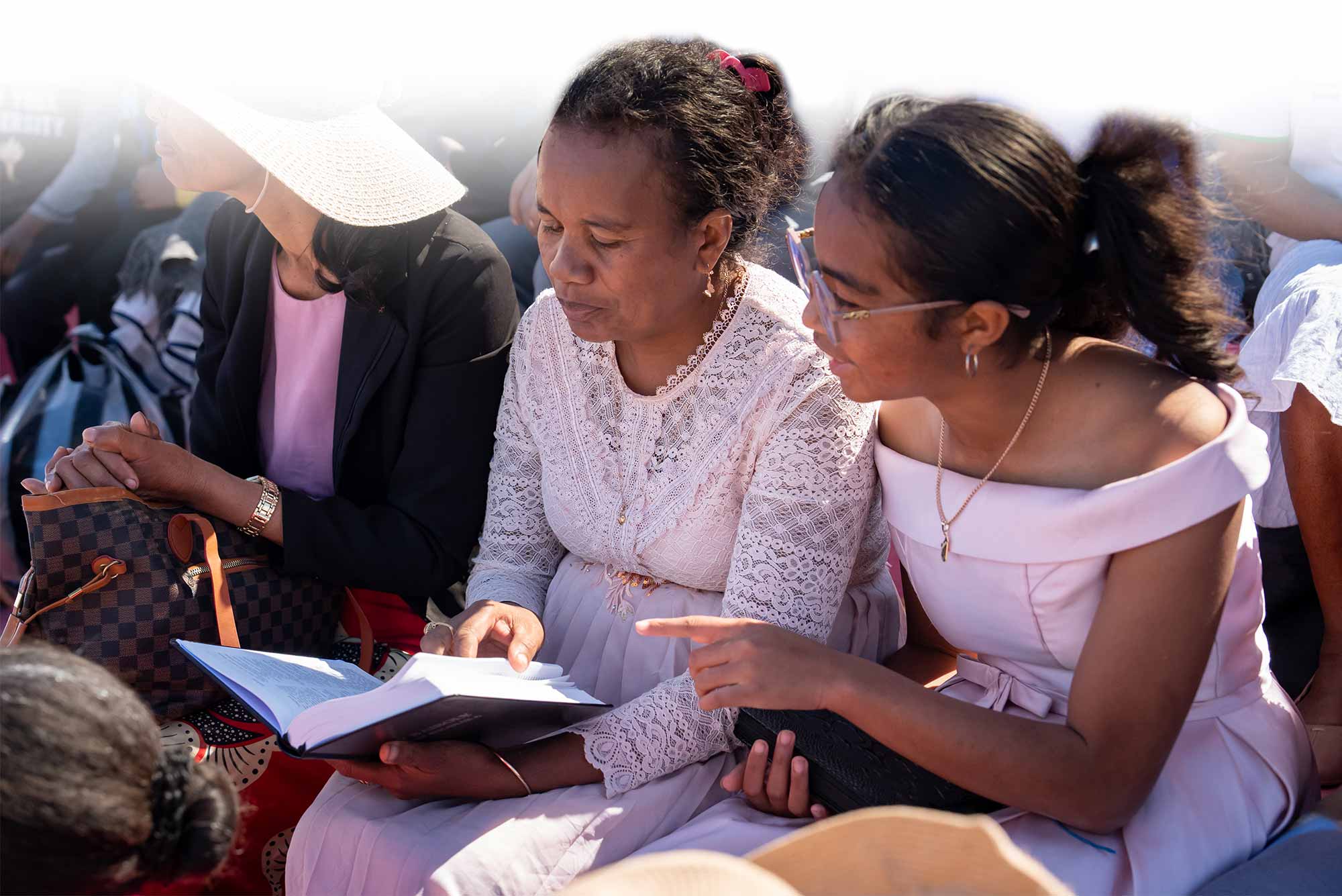 women reading the Bible together