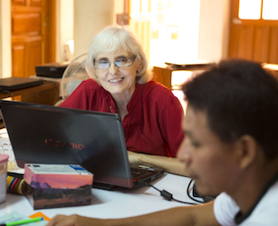 Two translators working at their computers.