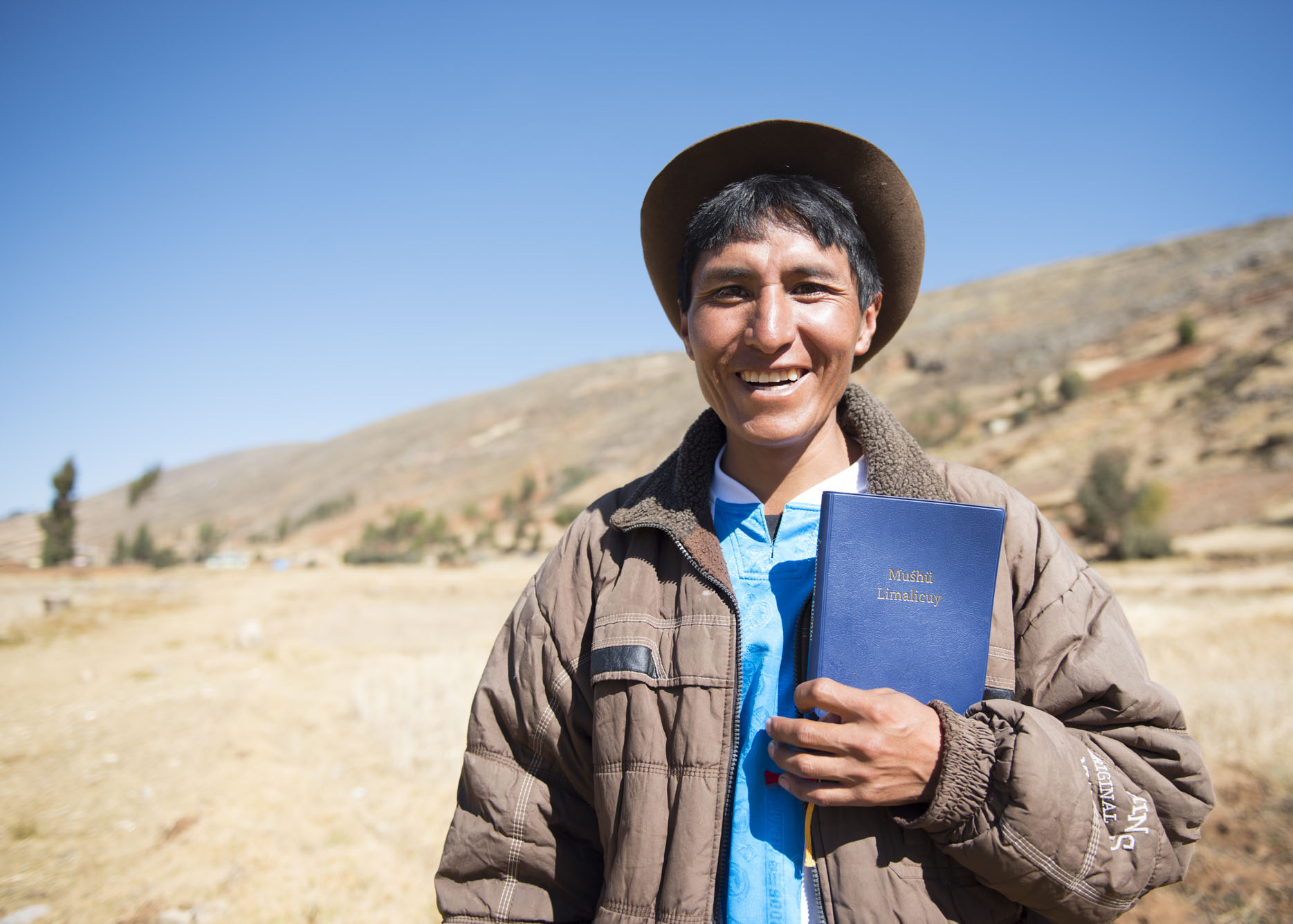 Robert holding the New Testament Robert holding the New Testament