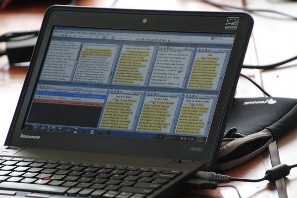 A computer screen with different passages open for cross-referencing A computer screen with different passages open for cross-referencing