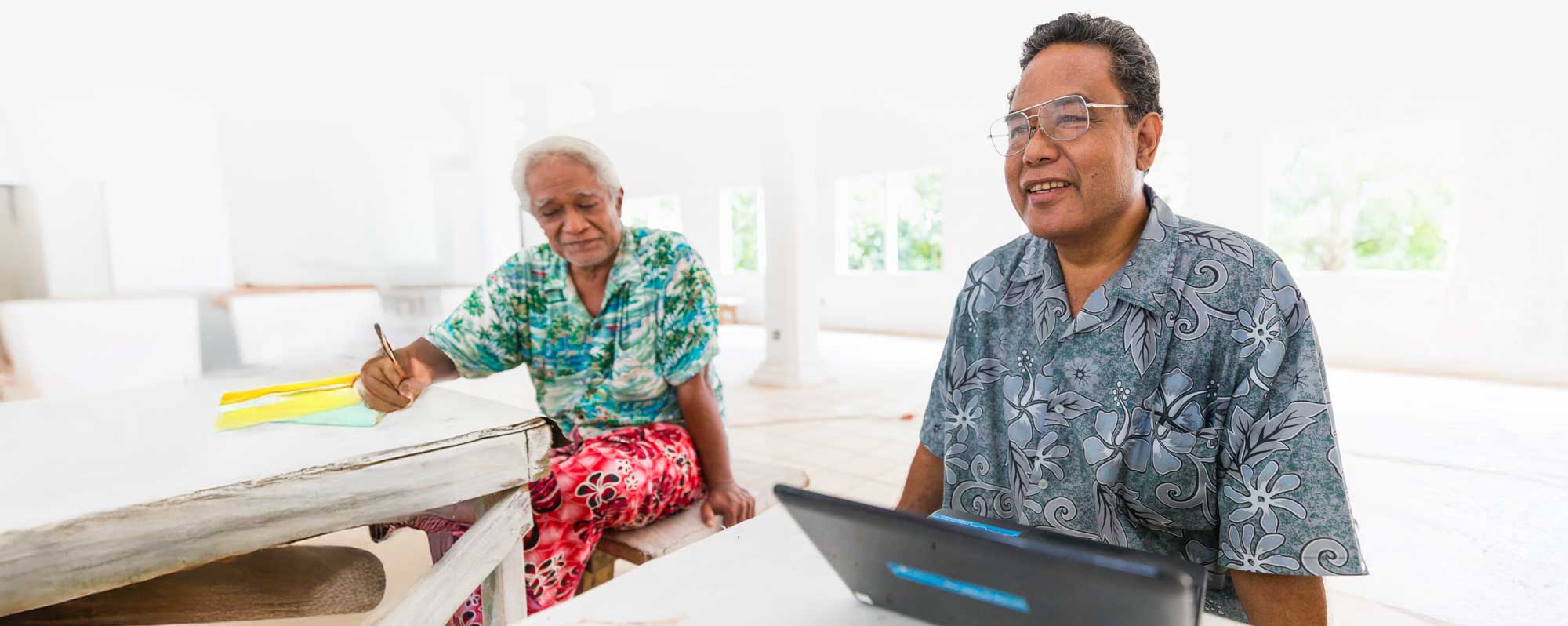 Pacific two translators at tables