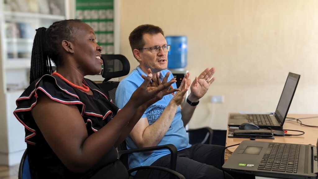 Sign language team members work in Tanzania.
