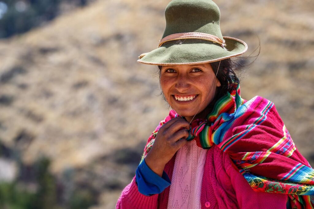A Peruvian woman smiling.