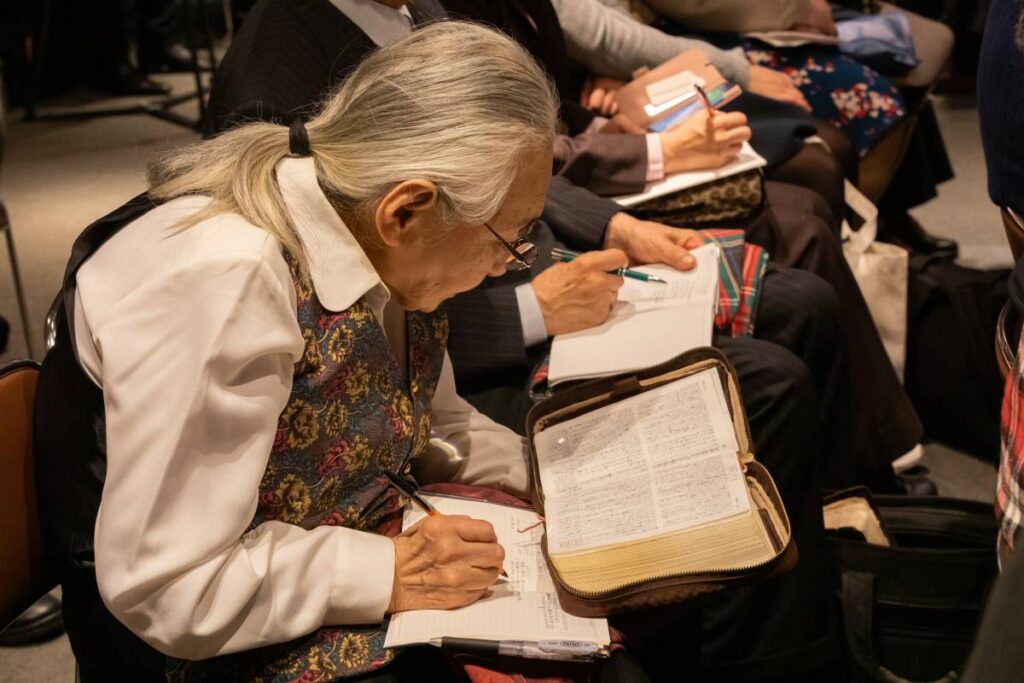Man from Japan reading and studying God’s Word.