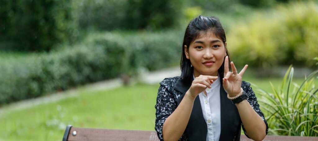 Thai sign language translator signing.